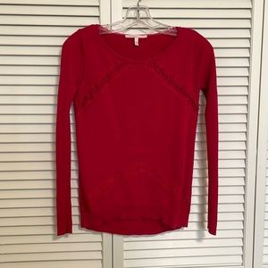 Red sweater VS